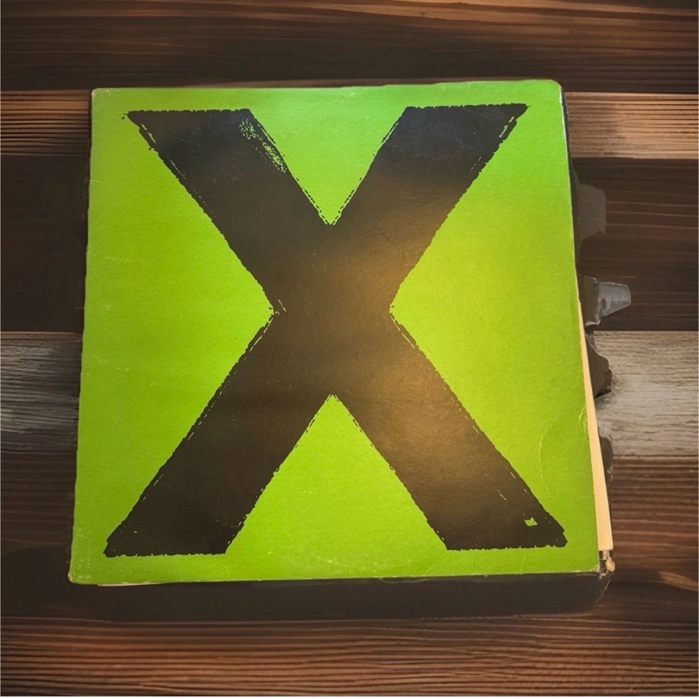 Green and Black 'X' Album Cover